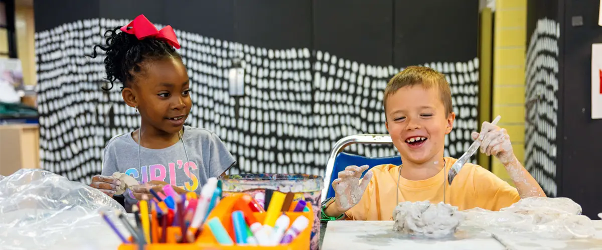 craft shop camp students with clay